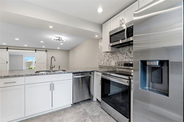 210 S MALCOLM COURT, Tampa, FL 33609