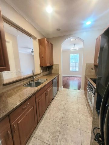 8707 Buckskin Mnr 5-12, Davie, FL 33328
