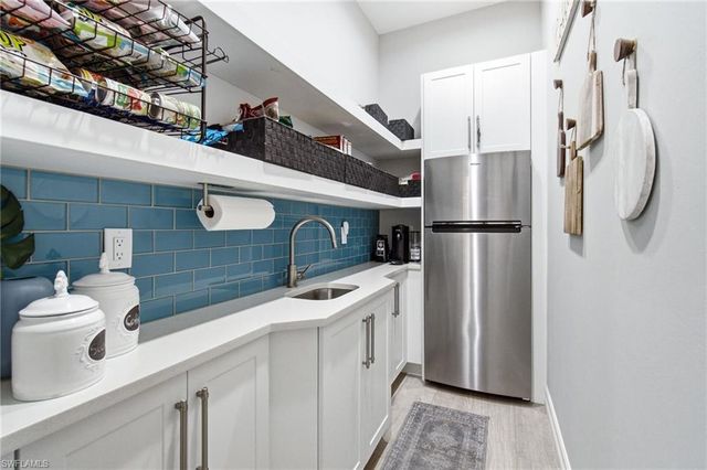 5737 Hidden Oaks LN, Naples, FL 34119