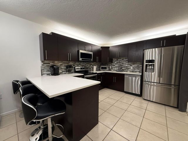 2410 24th Lane, Palm Beach Gardens, FL 33418