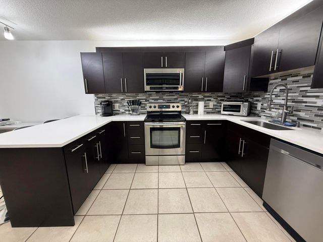 2410 24th Lane, Palm Beach Gardens, FL 33418