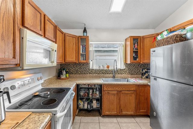 9911 FLYNT CIRCLE, Orlando, FL 32825