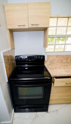 298 NW 104th St, Miami, FL 33150