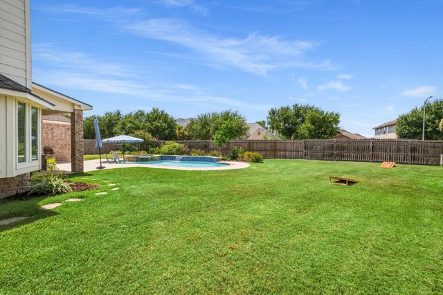 22315 Bridgestone Palm Court, Spring, TX 77388