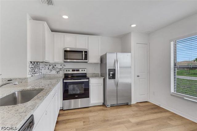 219 NW 25th TER, Cape Coral, FL 33993