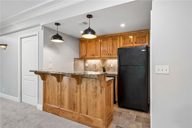 13232 Falmouth Street, Leawood, KS 66209