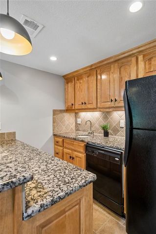 13232 Falmouth Street, Leawood, KS 66209