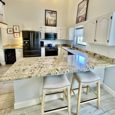 470 S Mars Way NE, Juno Beach, FL 33408