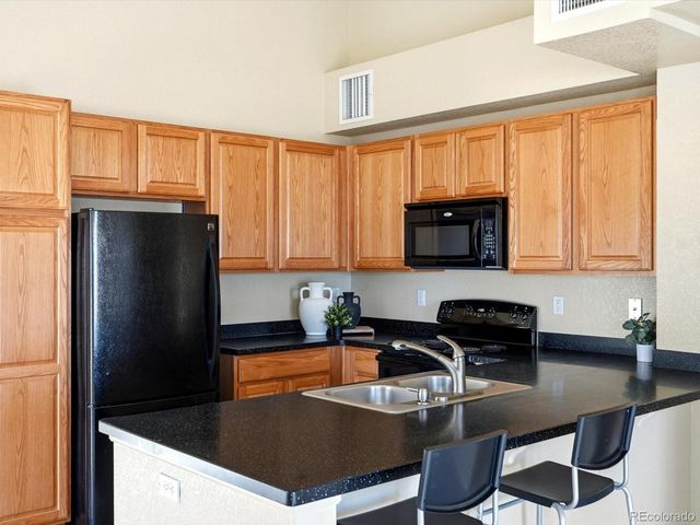 9585 Pearl Circle 203, Parker, CO 80134