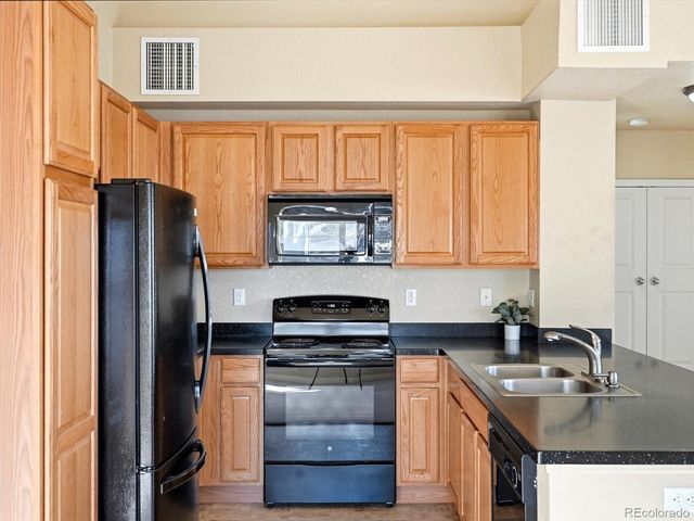 9585 Pearl Circle 203, Parker, CO 80134