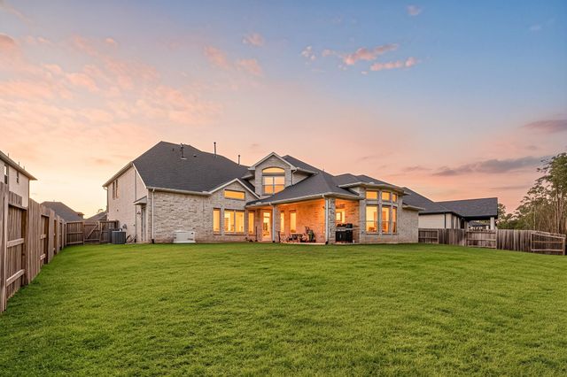 1021 Lakemont Bend Lane, Pinehurst, TX 77362