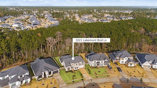 1021 Lakemont Bend Lane, Pinehurst, TX 77362