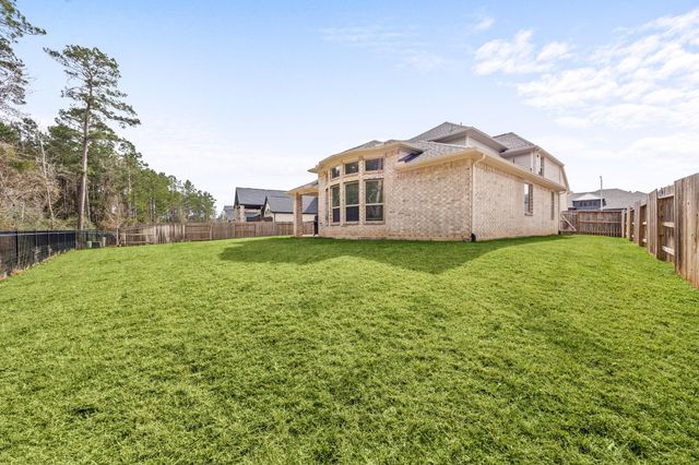 1021 Lakemont Bend Lane, Pinehurst, TX 77362