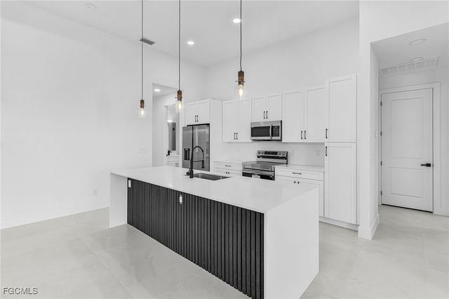 127 NW 14th AVE, Cape Coral, FL 33993