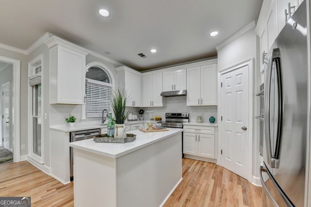 1118 Midsummer Court NE, Marietta, GA 30068