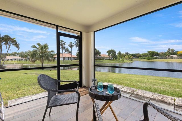 18551 Woodstream Drive, Boca Raton, FL 33498