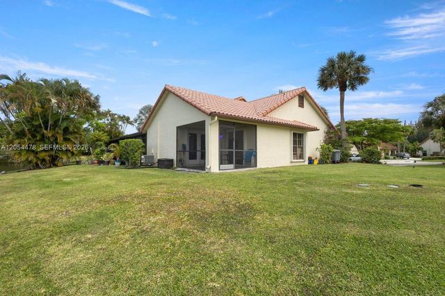 18551 Woodstream Drive, Boca Raton, FL 33498