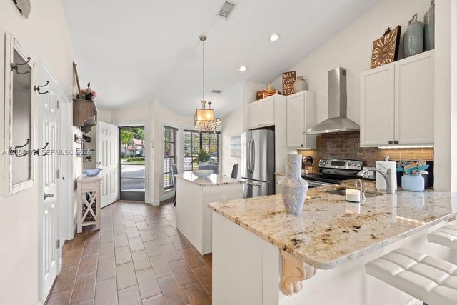 18551 Woodstream Drive, Boca Raton, FL 33498