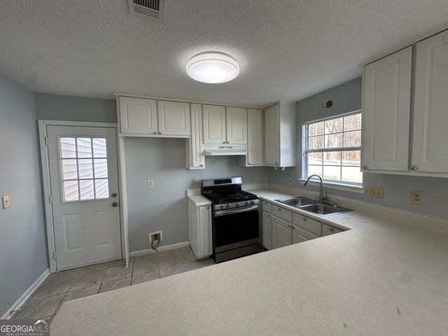 6609 Saganaw Drive, Rex, GA 30273