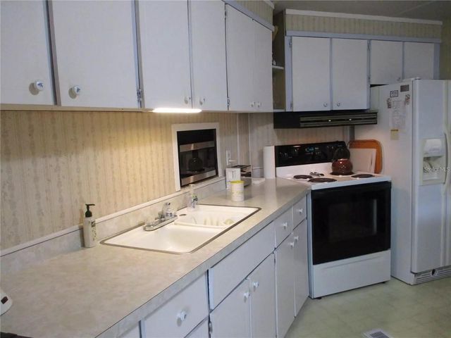 4024 REGGIE DR., Holiday, FL 34691