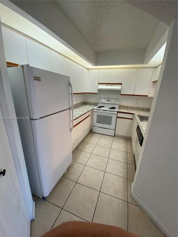 12950 SW 7th Ct 310A, Pembroke Pines, FL 33027