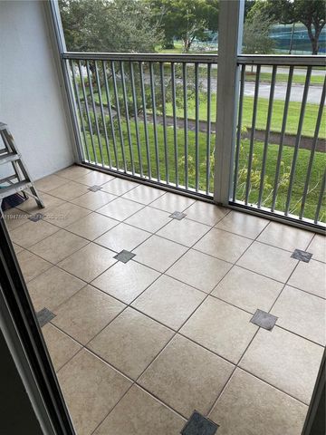 12950 SW 7th Ct 310A, Pembroke Pines, FL 33027