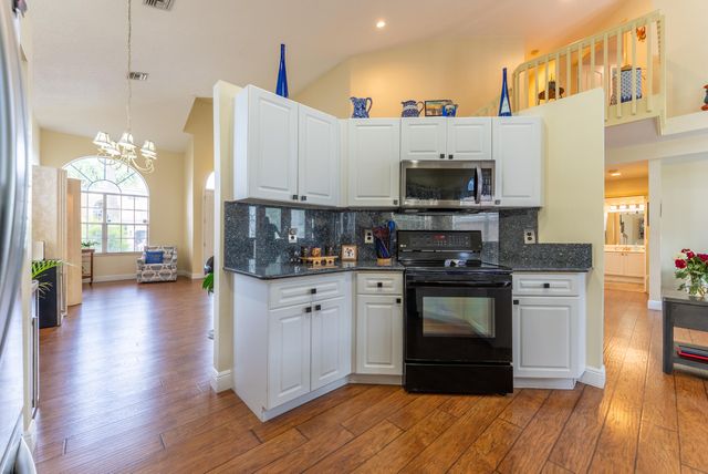 7040 Peninsula Lake Court, Lake Worth, FL 33467