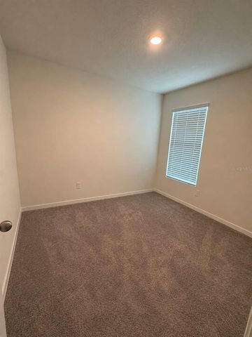 7171 CARIB GRACKLE DRIVE, Harmony, FL 34773