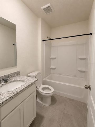 7171 CARIB GRACKLE DRIVE, Harmony, FL 34773