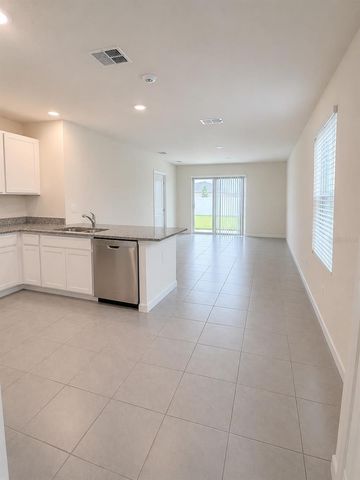 7171 CARIB GRACKLE DRIVE, Harmony, FL 34773