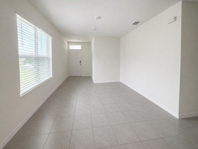 7171 CARIB GRACKLE DRIVE, Harmony, FL 34773