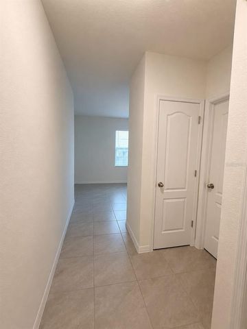 7171 CARIB GRACKLE DRIVE, Harmony, FL 34773