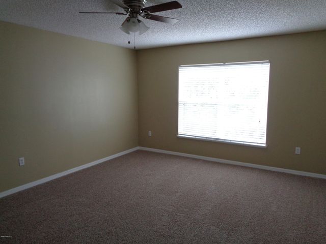 1677 Sawgrass Drive SW, Palm Bay, FL 32908