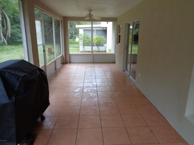 1677 Sawgrass Drive SW, Palm Bay, FL 32908