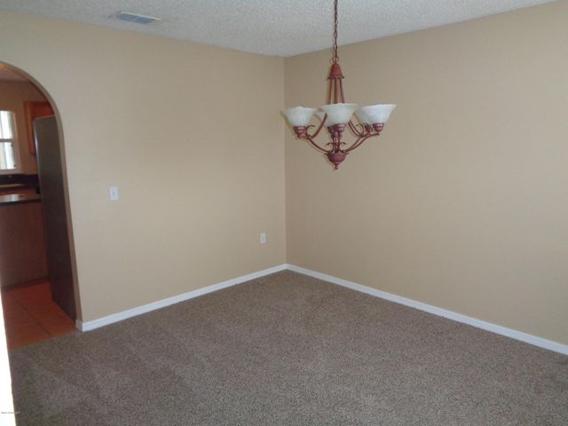 1677 Sawgrass Drive SW, Palm Bay, FL 32908
