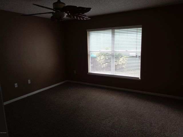 1677 Sawgrass Drive SW, Palm Bay, FL 32908
