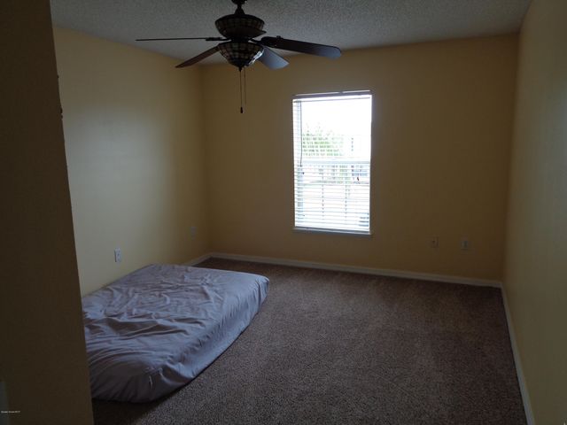 1677 Sawgrass Drive SW, Palm Bay, FL 32908
