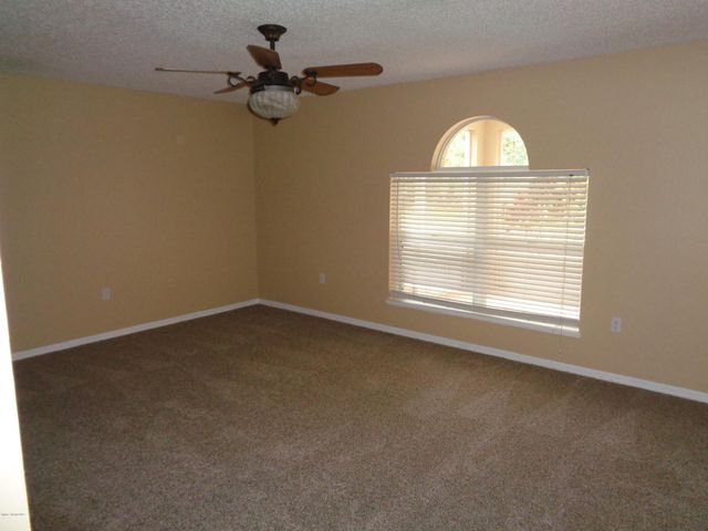 1677 Sawgrass Drive SW, Palm Bay, FL 32908