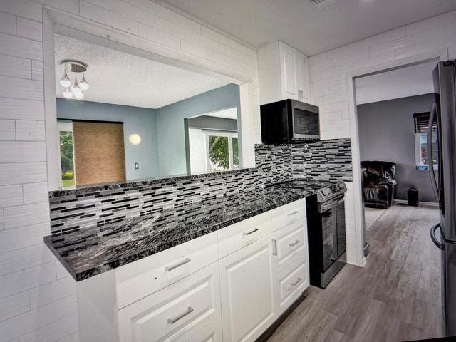 6309 Silver Moon Lane, Greenacres, FL 33463