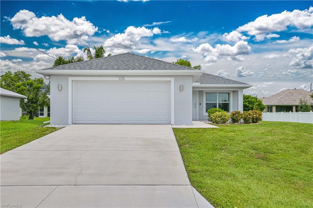 1125 NE 4th AVE, CAPE CORAL, FL 33909 — photo 2