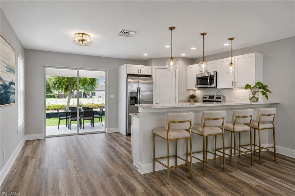 1125 NE 4th AVE, CAPE CORAL, FL 33909 — photo 5