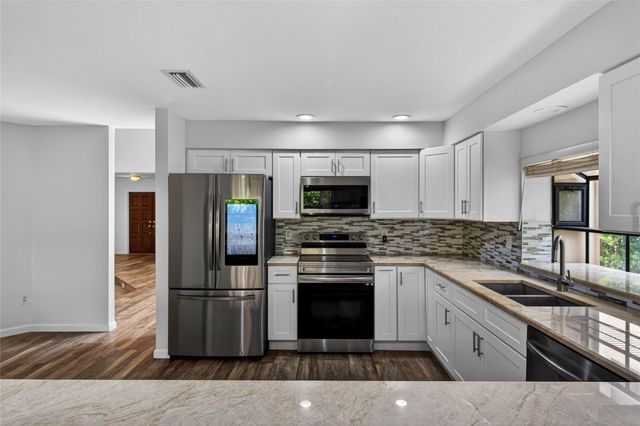 23203 L Ermitage Circle, Boca Raton, FL 33433