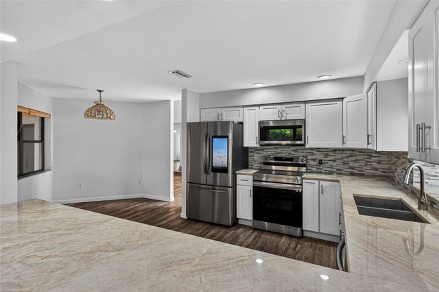 23203 L Ermitage Circle, Boca Raton, FL 33433