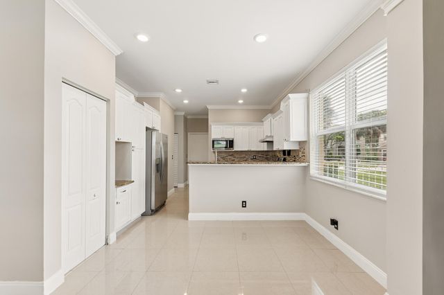 113 Canterbury Place, Royal Palm Beach, FL 33414