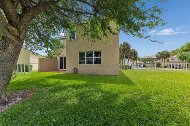 113 Canterbury Place, Royal Palm Beach, FL 33414