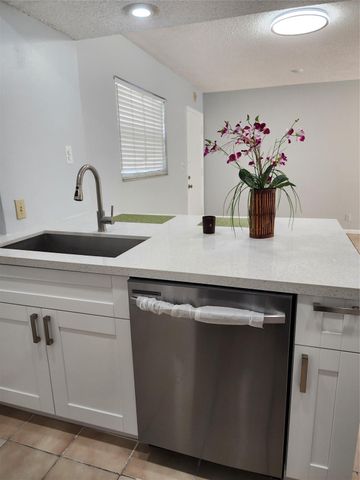 9150 NW 38th Drive 106, Coral Springs, FL 33065