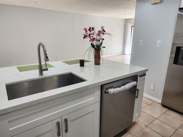 9150 NW 38th Drive 106, Coral Springs, FL 33065