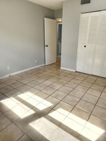 9150 NW 38th Drive 106, Coral Springs, FL 33065