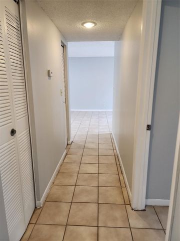 9150 NW 38th Drive 106, Coral Springs, FL 33065