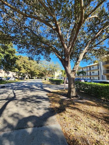 9150 NW 38th Drive 106, Coral Springs, FL 33065